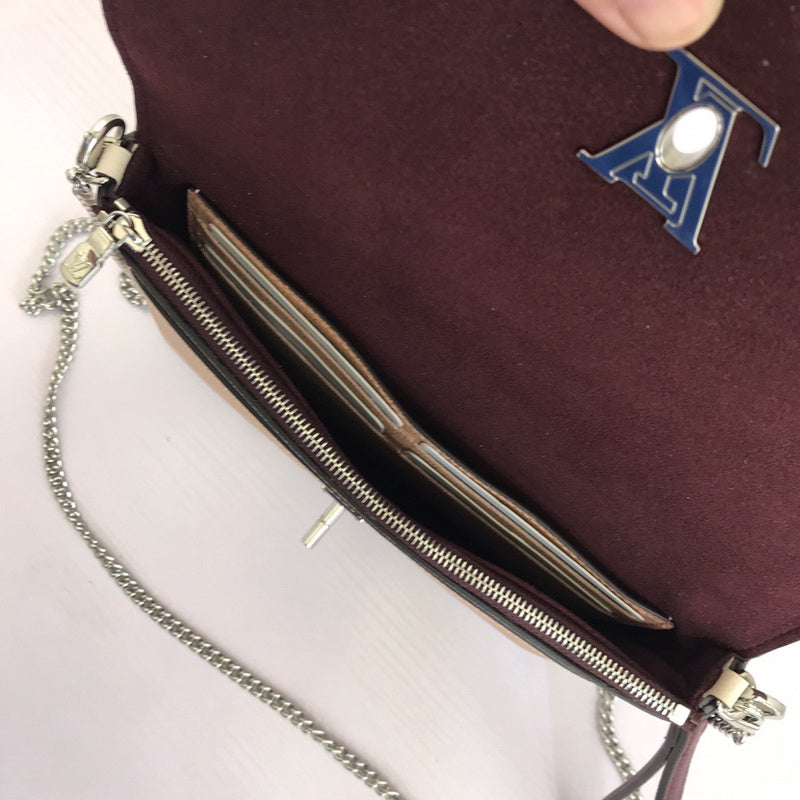 Front view of polished premium women's handbag – women's luxury handbag