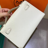 Side view of considered structured handbag