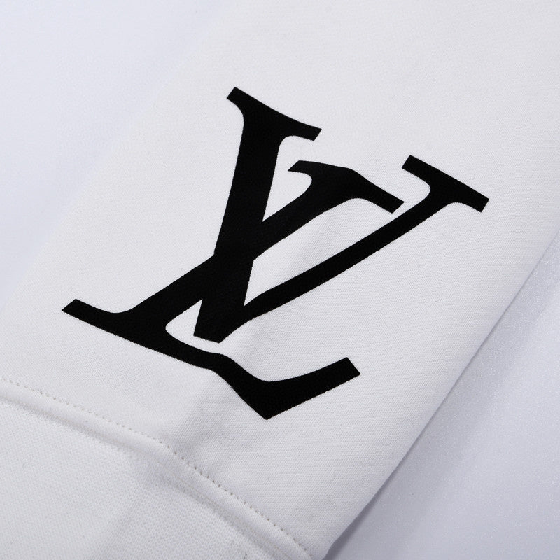 Flat lay presentation of Louis Vuitton luxury clothing with contemporary cut