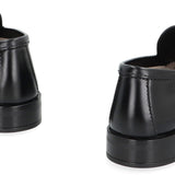 Close-up of Prada sandals hardware and fine stitching