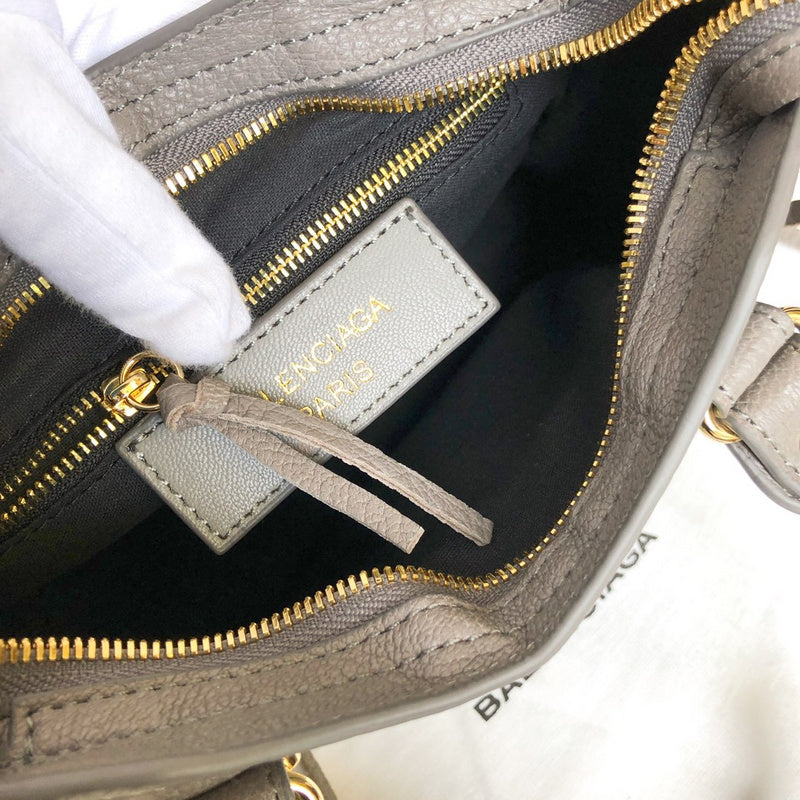 Close-up detail of polished structured women's handbag – women's designer-style accessory