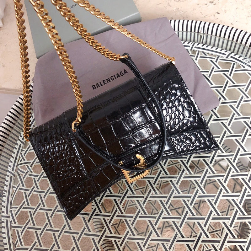 Styled lifestyle shot of structured modern women's handbag – women's luxury accessory