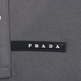 Close-up detail shot of Polo cotton polo shirt with monogram-inspired silhouette