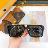 Side view of Louis Vuitton unisex sunglasses