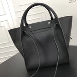 Styled lifestyle shot of modern statement women's handbag – women's designer-style accessory