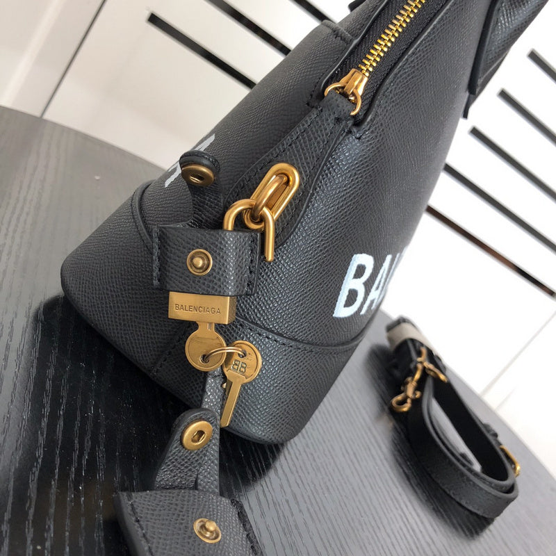 Styled lifestyle shot of signature statement women's handbag – women's designer-style accessory