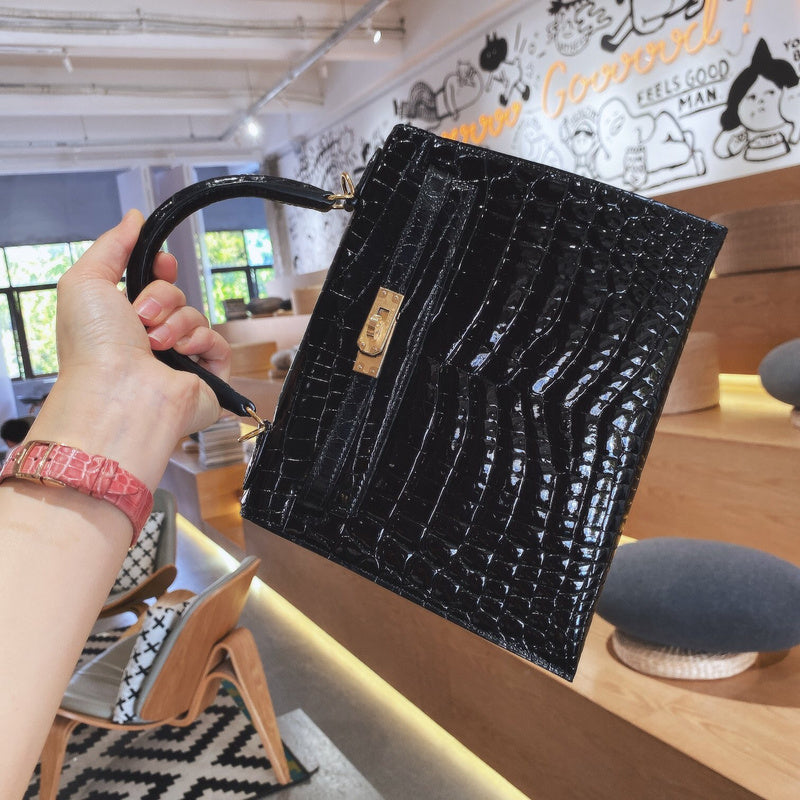 Side view of sculpted structured handbag