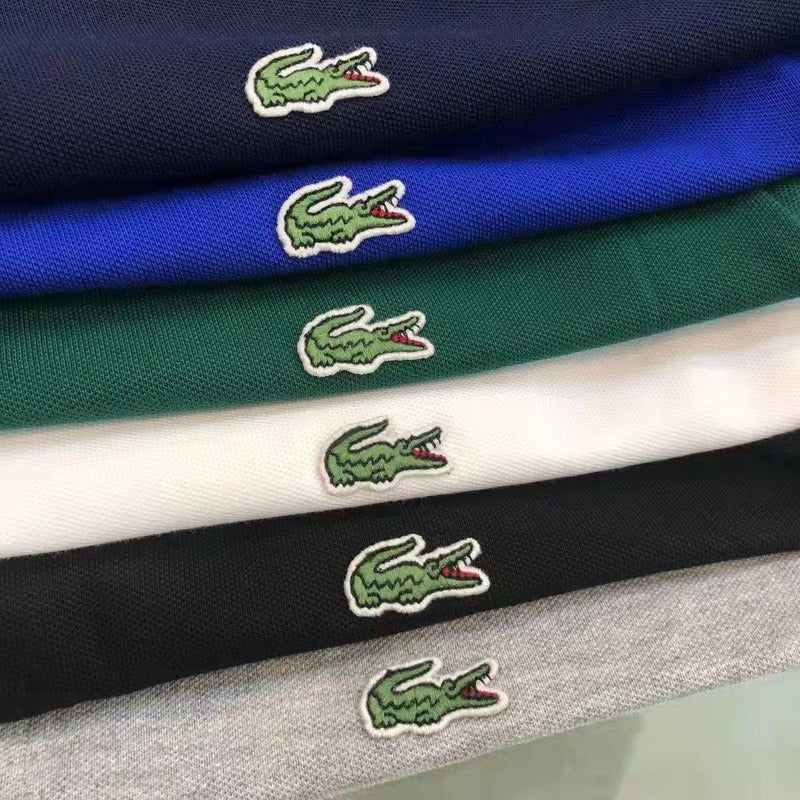 Close-up detail shot of Lacoste luxury clothing with signature branding