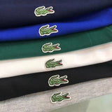Close-up detail shot of Lacoste luxury clothing with signature branding
