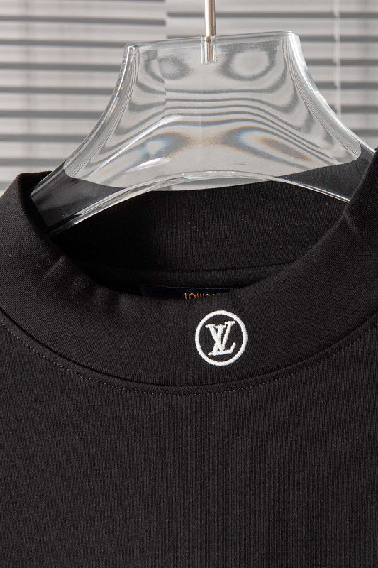 Back view of Louis Vuitton luxury clothing with label-forward styling