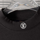 Back view of Louis Vuitton luxury clothing with label-forward styling