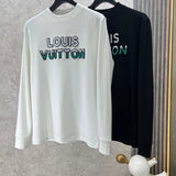 Close-up detail shot of Louis Vuitton luxury clothing with monogram-inspired silhouette