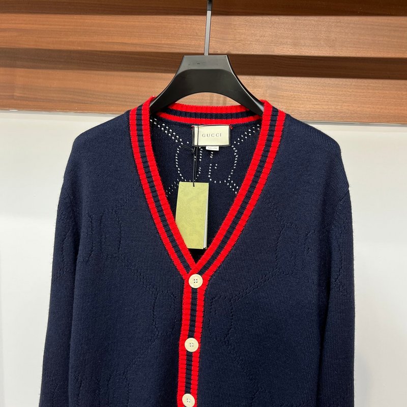 Close-up detail shot of Gucci luxury clothing with label-forward styling
