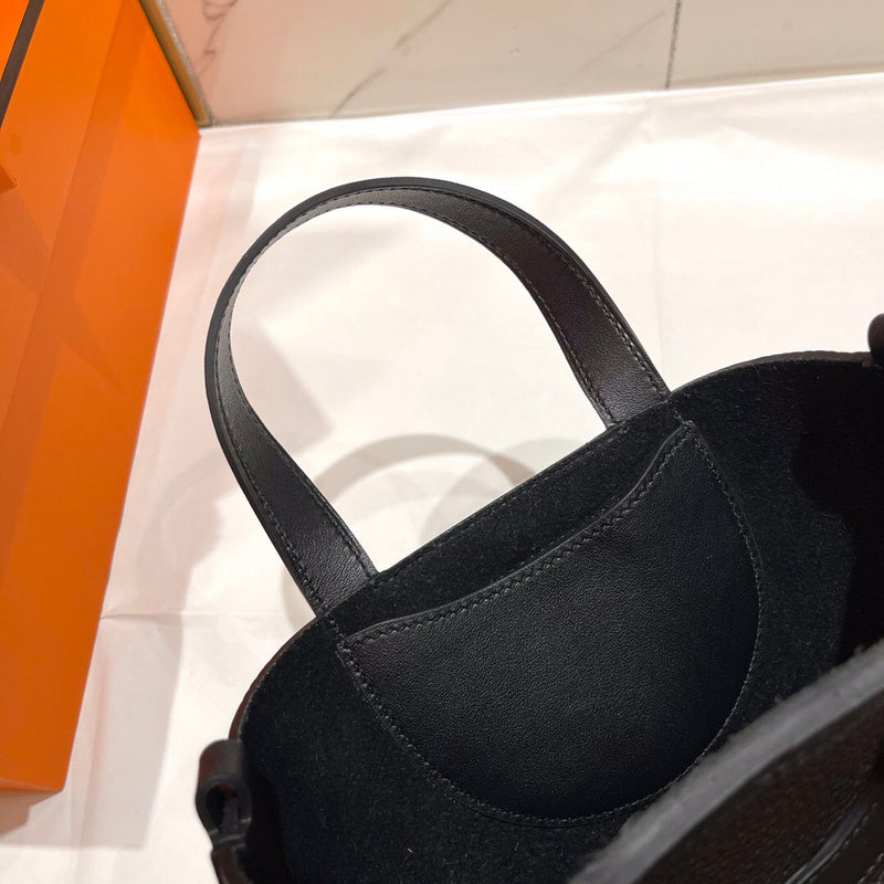 Side view of classic structured handbag