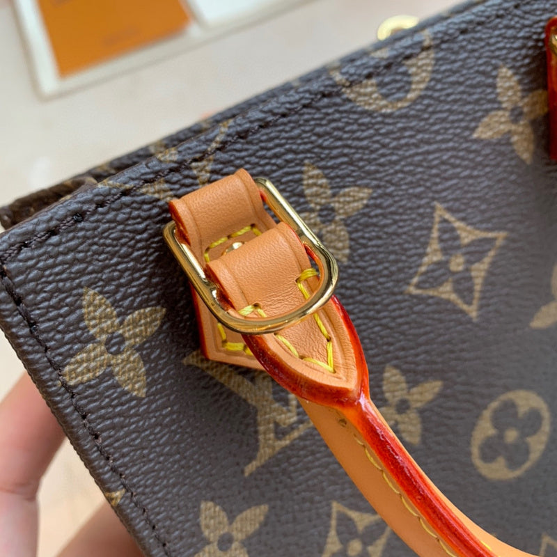 Side profile of sleek polished women's handbag – women's premium purse