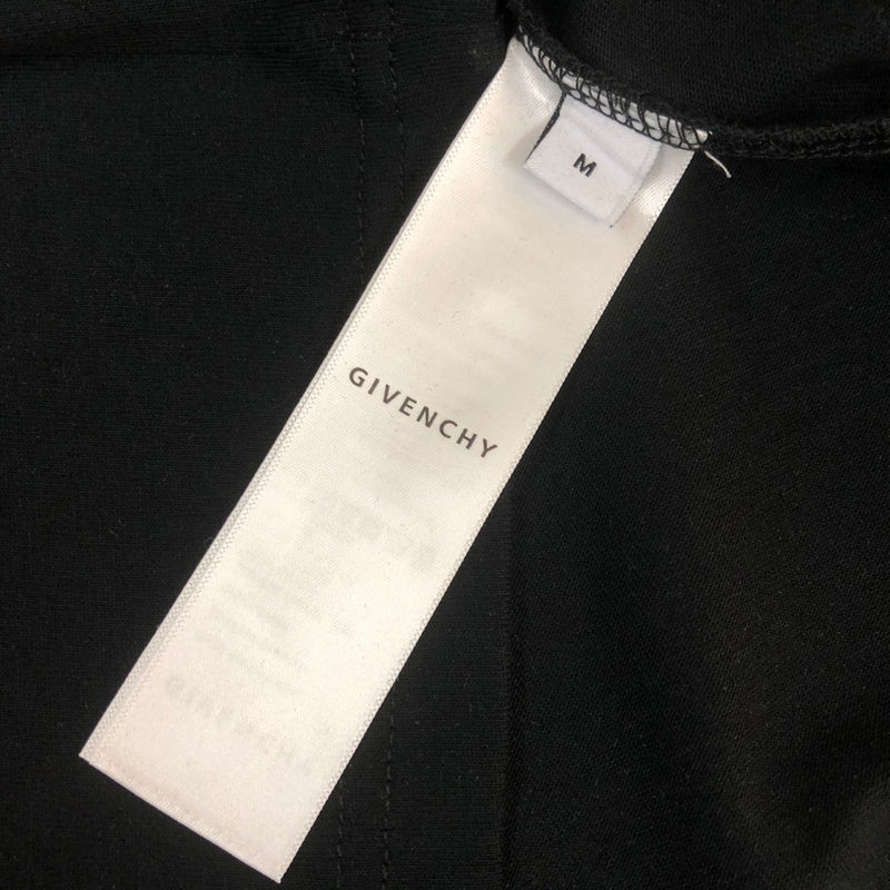 Side profile of Givenchy luxury clothing with tailored silhouette