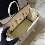 Side view of clean-lined structured handbag