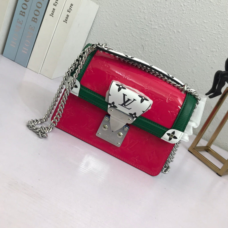 Side profile of structured modern women's handbag – women's statement bag