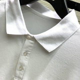 Close-up detail shot of Moncler luxury clothing with signature branding