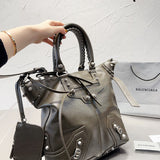 Ziva's Charm handbag – close-up view (one versatile size)
