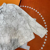 Full styled look of Gucci luxury clothing with logo-detail design