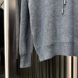 Flat lay presentation of Louis Vuitton luxury clothing with everyday silhouette