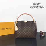 Front view of polished elevated women's handbag – women's statement bag