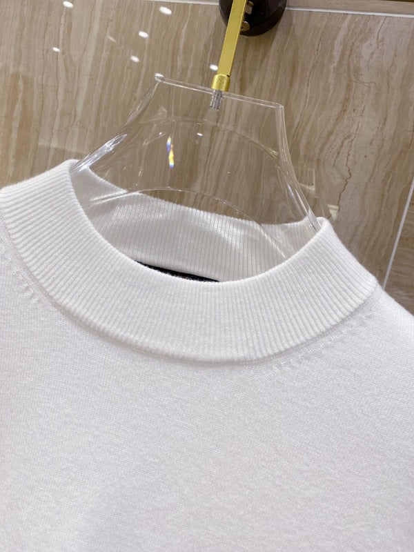 Back view of Louis Vuitton luxury clothing with streetwear-inspired cut