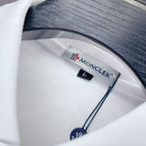 Side profile of Moncler luxury clothing with logo-detail design