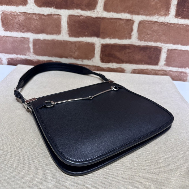 Styled lifestyle shot of statement refined women's handbag – women's luxury handbag