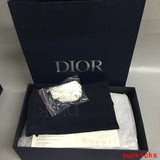 Dior Grey High-Top Sneakers - Side Profile View