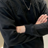 Back view of Louis Vuitton luxury clothing with relaxed-fit cut