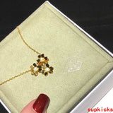Side view of Van Cleef & Arpels unisex jewelry piece