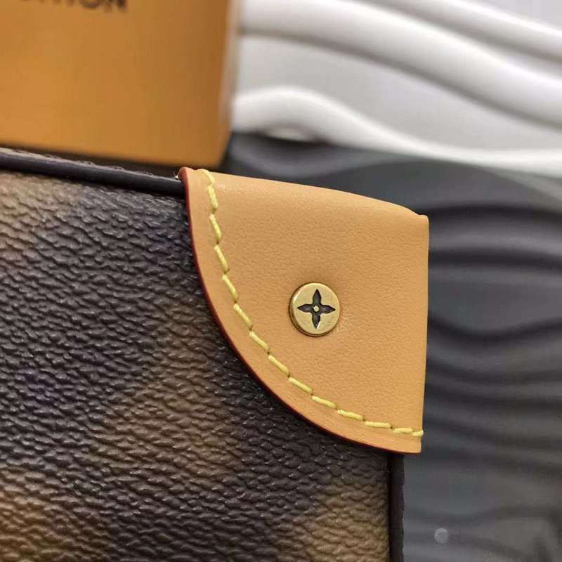 Top view of premium sleek women's handbag – women's luxury accessory