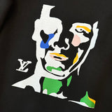 Back view of Louis Vuitton luxury clothing with signature branding