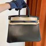 Streamlined handbag styled for everyday wear