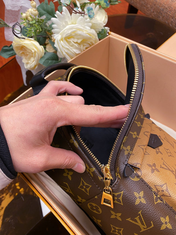 Side profile of structured everyday-luxe women's handbag – women's statement bag