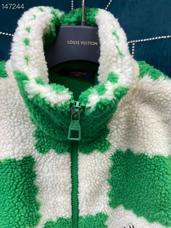 Close-up detail shot of Louis Vuitton luxury clothing with signature branding