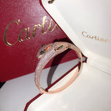 Side view of Cartier unisex jewelry piece