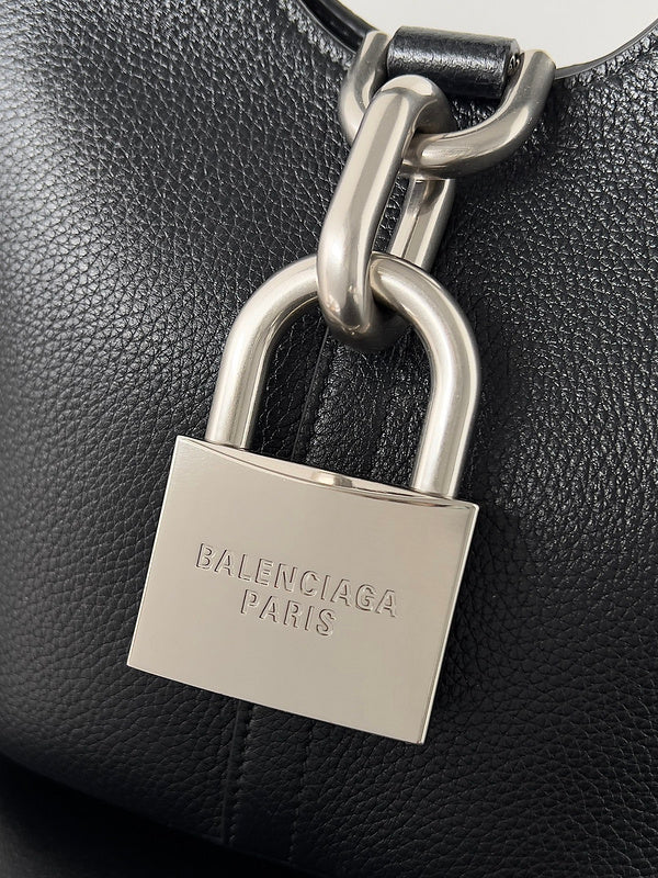 Zivas Charm Versatile Design Statement Handbag (Signature Shape & Finish) – Lifestyle Shot
