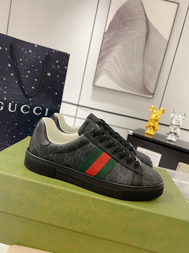 Gucci Designer sneakers in muted earth tones heritage-inspired look front view