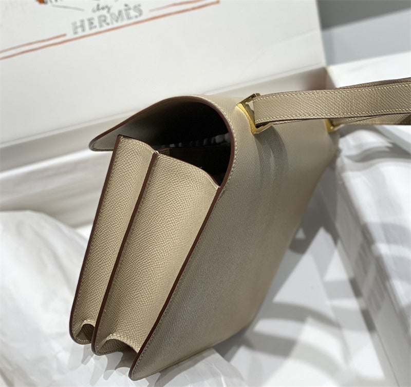 Side view of streamlined structured handbag