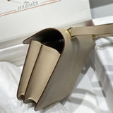 Side view of streamlined structured handbag