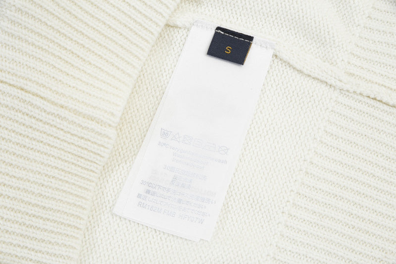 Close-up detail shot of Louis Vuitton luxury clothing with relaxed-fit cut