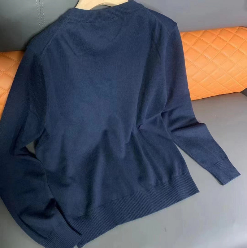 Back view of Lacoste luxury clothing with monogram-inspired silhouette