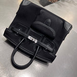 Side view of graceful structured handbag