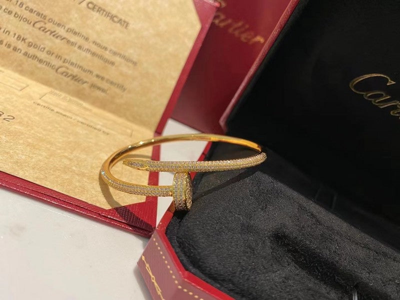 Close-up detail view of Cartier unisex jewelry piece