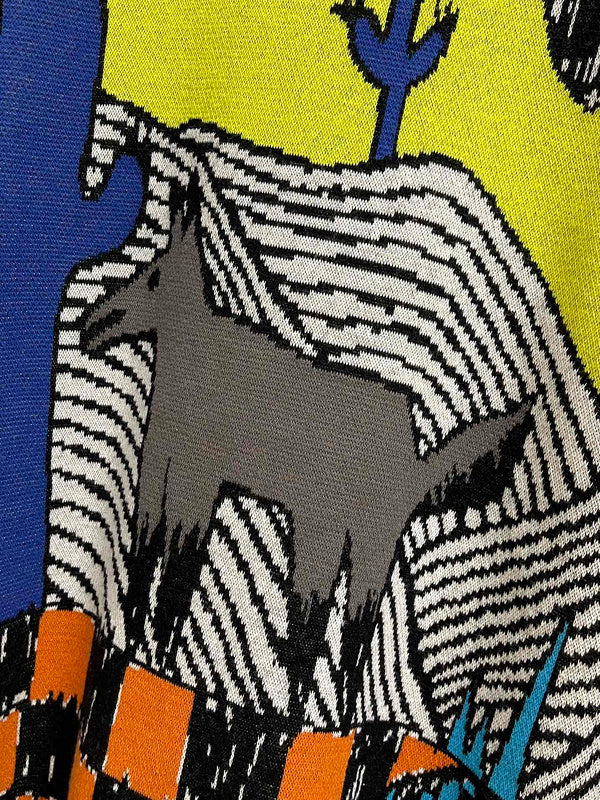 Flat lay presentation of Louis Vuitton luxury clothing with logo-detail design