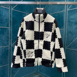 Close-up detail shot of Louis Vuitton luxury clothing with signature branding