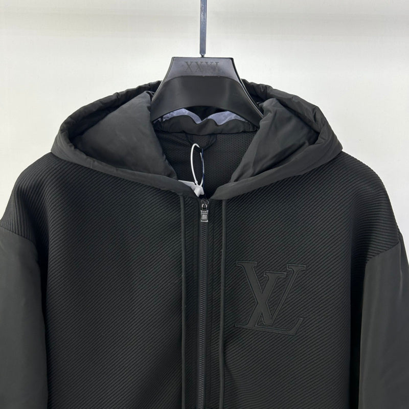 Side profile of Louis Vuitton luxury clothing with label-forward styling